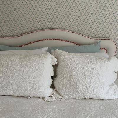 Beds with upholstered headboardsâ€”we have a lovely queen sized bed plus 4 pairs of twin beds with matching headboards