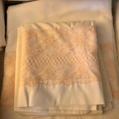 Loads of vintage linensâ€”handkerchiefs, guest towels, sheets, little cocktail napkins, lots are handmade and embroidered, everything you...
