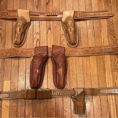 Belts with revolver holsters