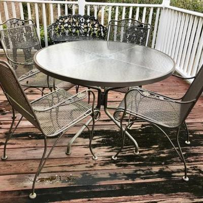 glass top and metal patio table and set of 4 chairs $279
table 42 X 28 1/2'