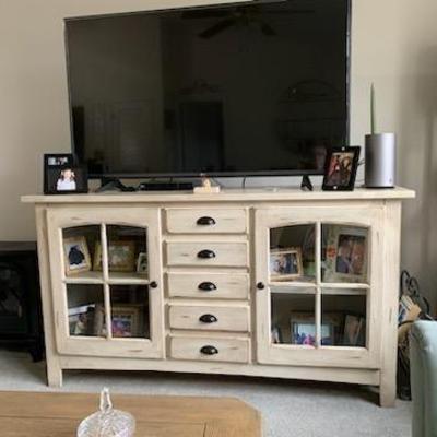 Media cabinet. 
Will hold up to 70" flat screen tv