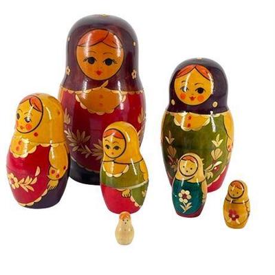 Lot 034.  
Vintage Russian Wooden Nesting Dolls Set of Seven (7) Pieces