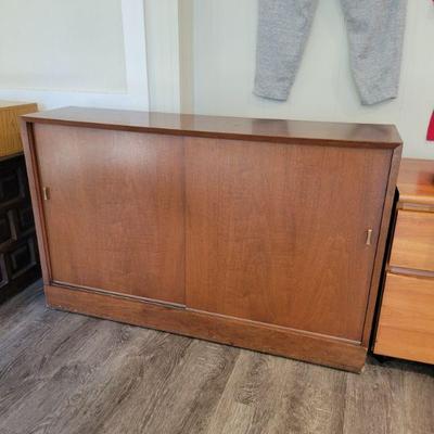 Mid Century Modern ( MCM ) sliding door cabinet.  $45