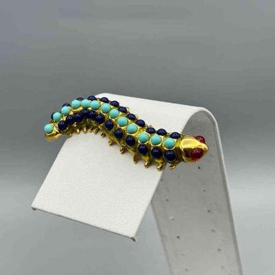 Caterpillar Pin signed KJL
