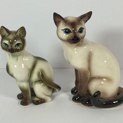 Porcelain Siamese cats