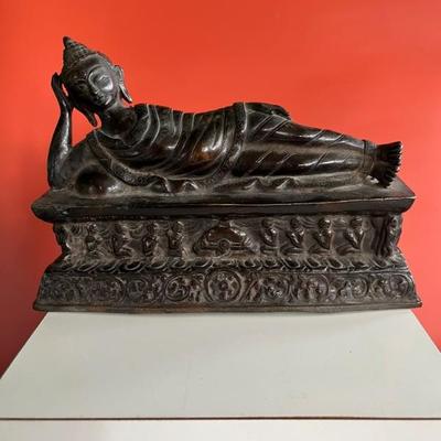 Antique cast metal sleeping buddha