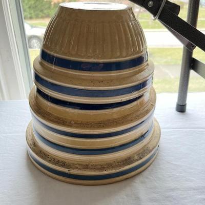 Lots of antique stoneware mixing bowlsâ€”Bennington Pottery, Roseville, and more