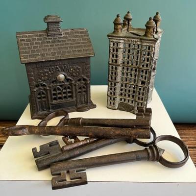 Antique cast iron coin banks and keys