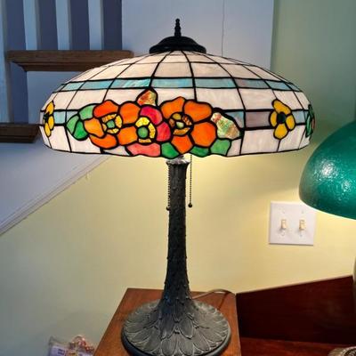 Antique Art Nouveau style stained glass lamp. The shade is in perfect condition and features glowing poppies and faceted jewel glass. The...