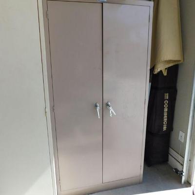 Multiple storage cabinets will be for sale, both metal Century cabinets have keys.