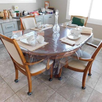 Thomasville dining table with ROLLING chairs!