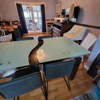 Expandable glass top dining table and 6 chairs 450.00