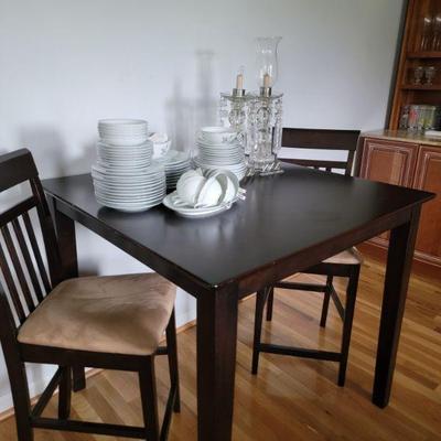 Pub table and 2 chairs 150.00