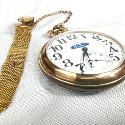BIHY913 1915 Ford Motor Co Gold Plated Pocket Watch & Gilded Fob	Manufactured by the Illinois Co., in working order, grade 303, size 16,...