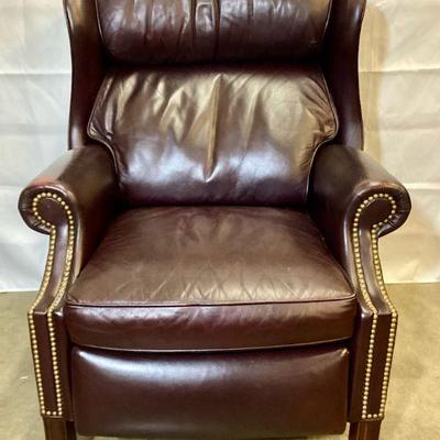 KEKA101 Hancock & Moore Leather Recliner (Lot 2)	Traditional oxblood, brown, wing back reclining chair.Â 
