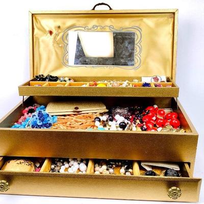 BIHY923 Jewelry Box Full Of Vintage Jewelry	3 tier gold colored jewelry box full of 16 dividers of earrings, necklaces, rings, brooches,...