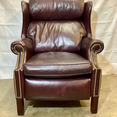 KEKA100 Hancock & Moore Leather Recliner (Lot 1)	Traditional oxblood, brown, wing back reclining chair.Â 
