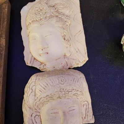 pair of Chinese stone faced carvings