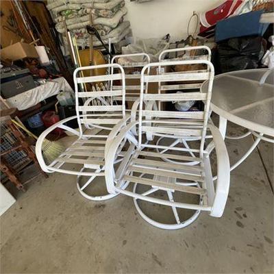 Lot 800-002  
Patio Table and Swivel Chair Set