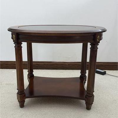 Lot 025   
Glass Top Oval End Table