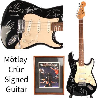 Autographed Motley Crue Guitar & photo