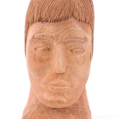 Carved wooden head