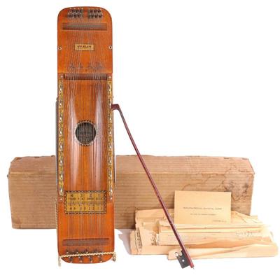 Antique Ukelin with box, box, music