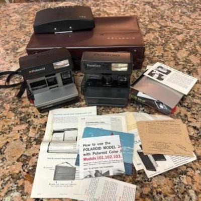 #9005 â€¢ 2 Vintage Polaroids, Case and Manuals
