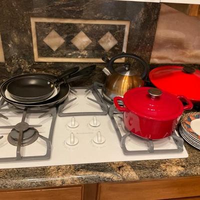 red pot and frying pans sold