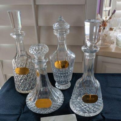 188	4 Crystal Decanters	$80.00