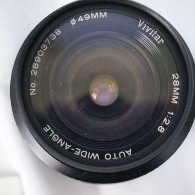 162	Honeywell Pentax SP 500 Film Camera w 2 Lenses	$45.00
