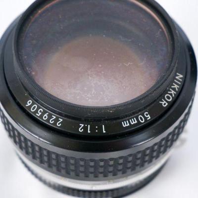 164	Nikon FE Film Camera w 50mm 1.2 & 43-86mm 3.5 Nikkor Lenses	$150.00