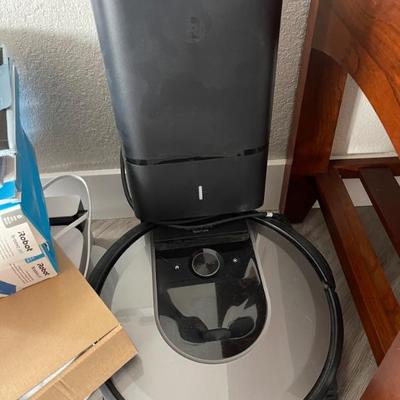 Roomba vacuum- self cleaning 