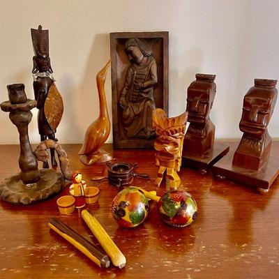 Lot 030-P: Wooden World-Cultural Assortment

Description: 
â€¢	An assortment of wooden figurines, statuettes and percussion instruments...