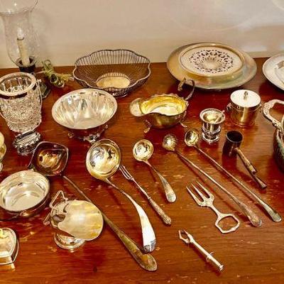 Lot 066-P: Silver-Plate Lot #1

Includes: An assortment of serving dishes and utensils, electric hurricane lantern-style lamps, trinket...