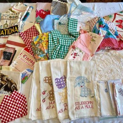Lot 050-P: Vintage Linens

Description: Includes aprons, cocktail napkins, Christmas tablecloth, and world themed linen tea towels....