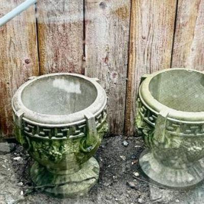 Lot 093-P: Concrete Planter Quartet

Description: 
â€¢	A foursome of heavy concrete planters 
â€¢	Trim work shows...