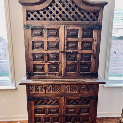 Lot 003-LR: Rustic MC Spanish Revival Storage Cabinet

Features: 
â€¢	Purchased by our clients around 1970 during their residence in...