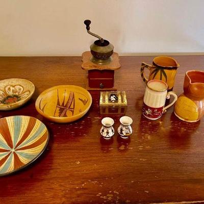 Lot 047-P: Assorted Travel Treasures

Description: Small treasures include handmade bowls (one signed), pottery pitchers/mugs, coffee...