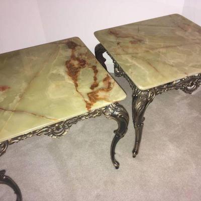 Lot 006-BR1: Marble Side Table Duo #1

Description: 
These elegant tables feature beige and brown marble tops resting on intricately...