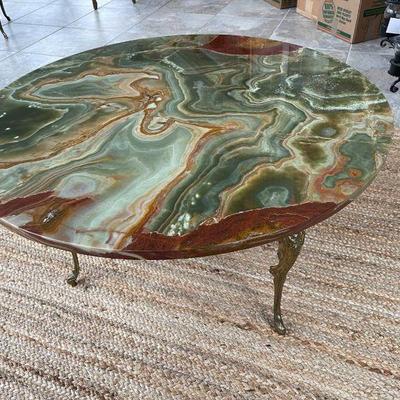 Lot 019-P: Emporador Marble Table

Description: 
This remarkable, stunning round table showcases the intricate patterns of Emperador...