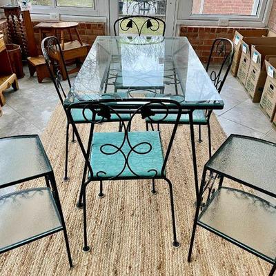Lot 088-P: Wrought-Iron Patio Furniture Set 

Features: 
â€¢	Wrought-iron set consisting of a glass topped table, four chairs and two...