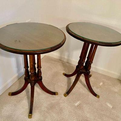 Lot 079-MBR: Antique Round Occasional Table Pair

Description: 
â€¢	Four-legged antique side tables
â€¢	Both have protective plate-glass...