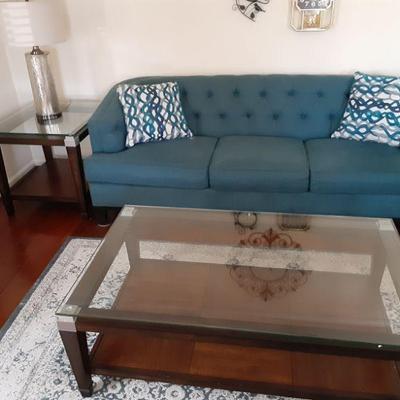 Blue button tuck couch