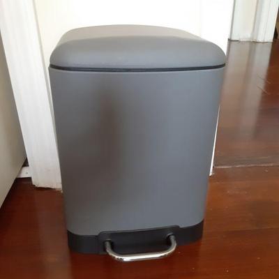 Gray trash can