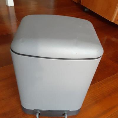 Small gray trash can