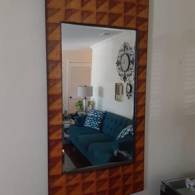 Brown and gold tone mirror