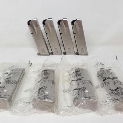 #2300 â€¢ (8) Sig Sauer 9mm 15rd Magazines
