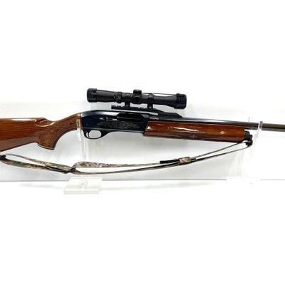 #1402 â€¢ Remington 1100 12ga Shotgun with Scope
