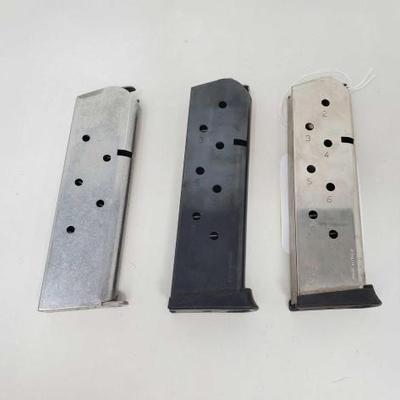 #2208 â€¢ (3) Colt .45 Magazines and (1) Magazine Holster
